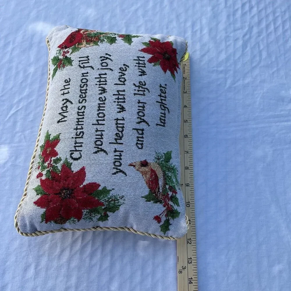 Small tapestry Christmas pillow Poinsettia graphic